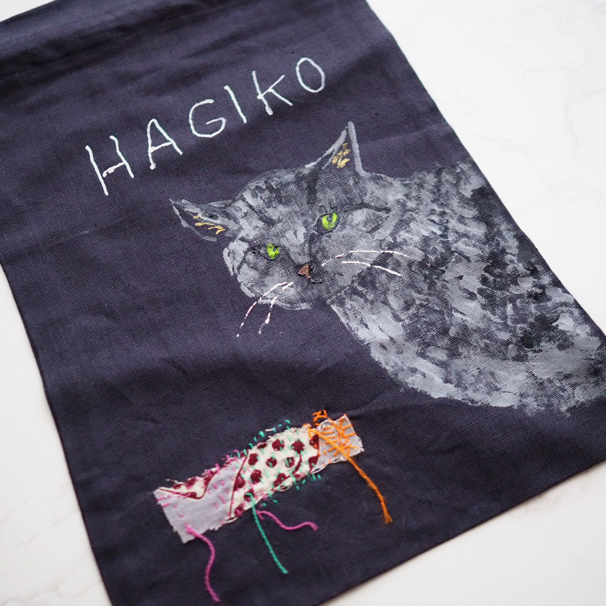 ハンドペイント&ダーニング刺繍のUKIKI CATS 巾着